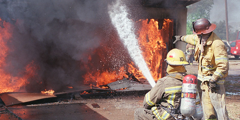 Fire technology students put out a fire