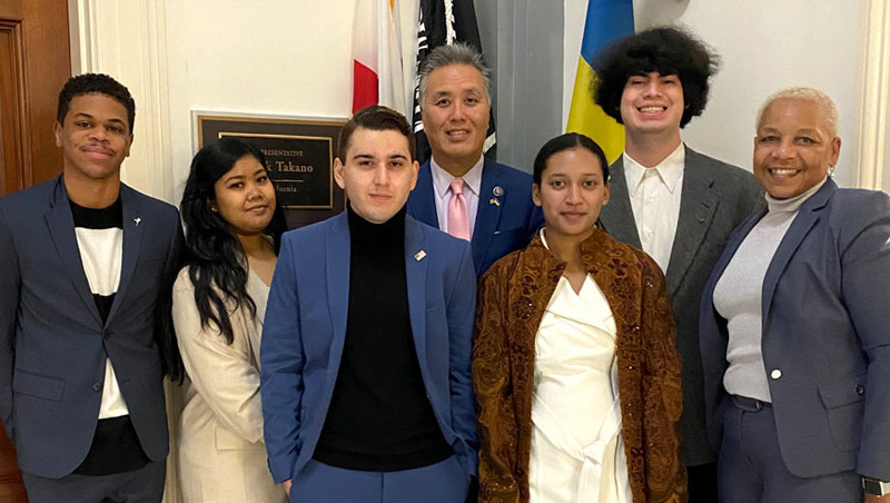 ASMVC student leaders gather with Frankie Moore, professor, and Mark Takano, US Representative.