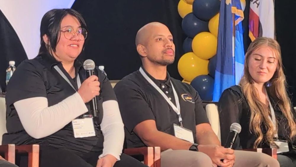 Three apprenticeship students participate in an on-stage panel, with MVC student Amy Castrejon featured left