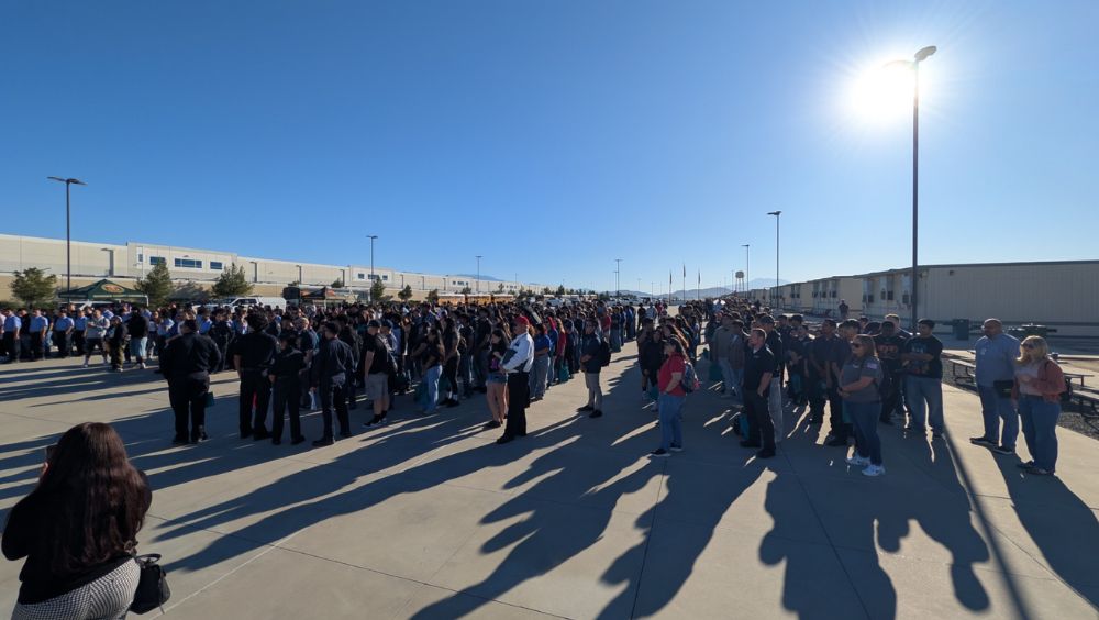 A large crowd of students gather on the Ben Clark campus