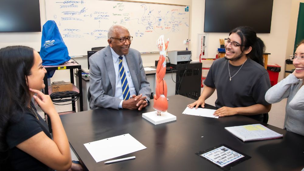 Chancellor Wolde-Ab Isaac speaks with STEM students