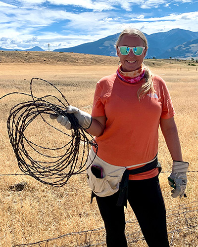 Anya-Kristina Marquis in the Greater Yellowstone Ecosystem while helping remove barbed wire fencing
