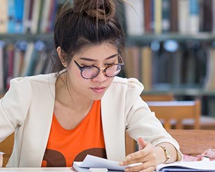 A student studies in the library