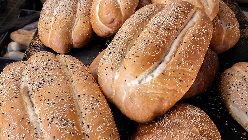 Pile of freshly baked loaves of bread