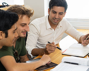 Three students study together