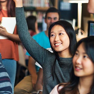 A student raises her hand