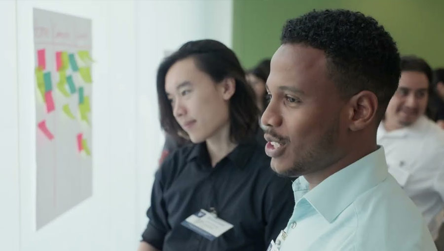 Image of two students working at a whiteboard from a video discussing the MESA program